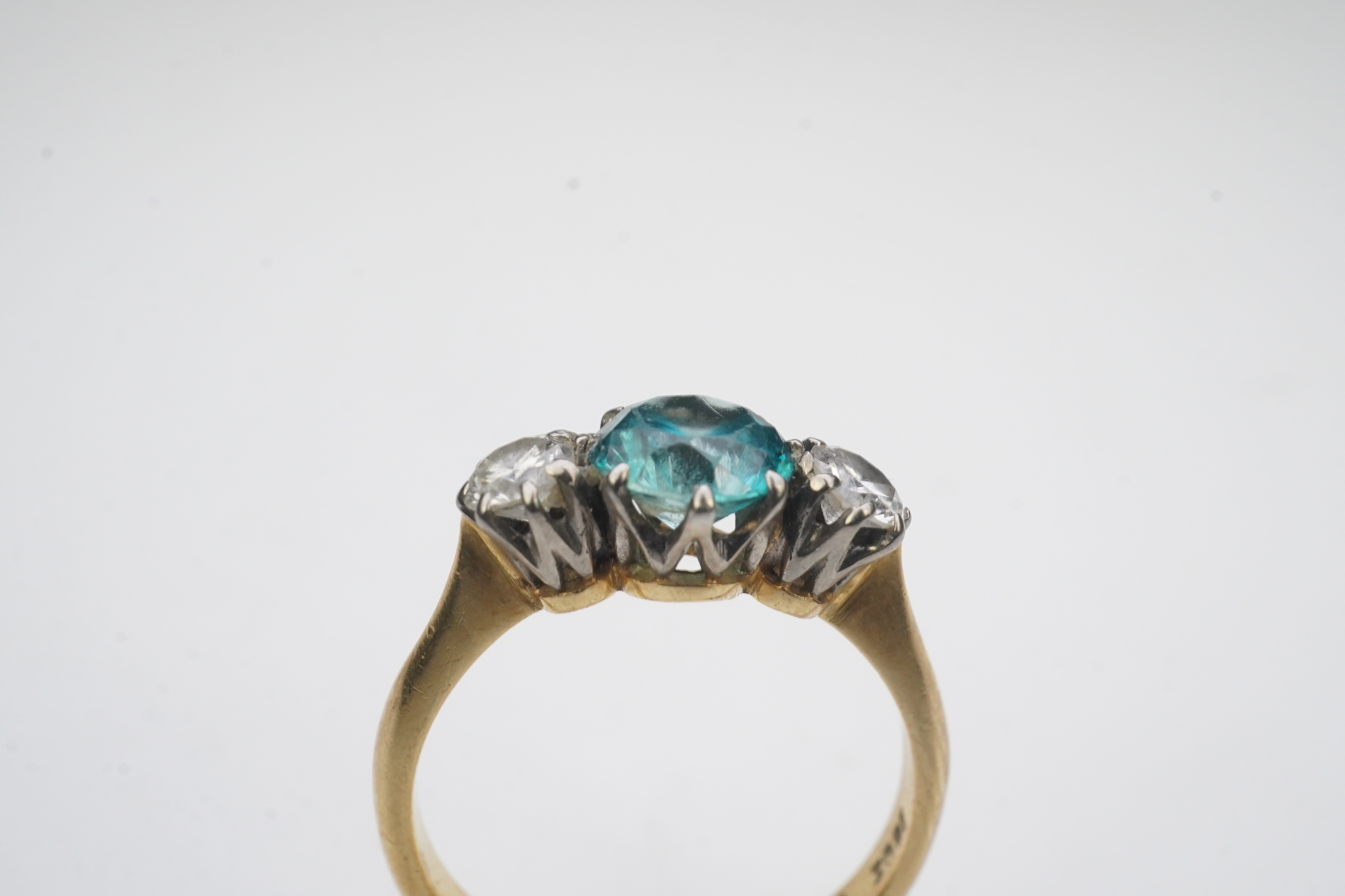 A zircon and diamond ring